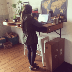 standing and working on computer