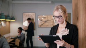 woman reading tablet