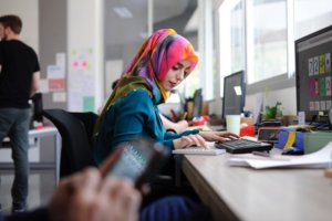 professional with colorful scarf