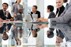 people sitting around in a meeting