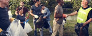 volunteers picking up trash in a park