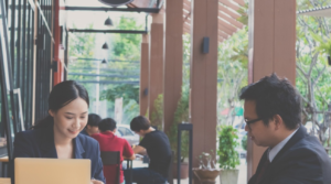 business workers sitting at a table