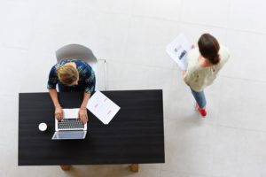 two employees working in an office