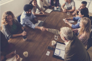 employees sitting at a table