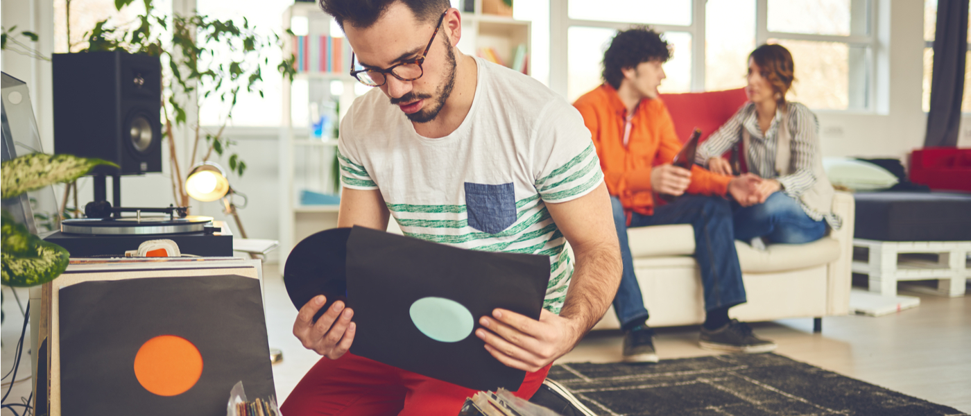 Man holding vinyl record