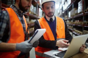 manufacturing workers using performance management tech